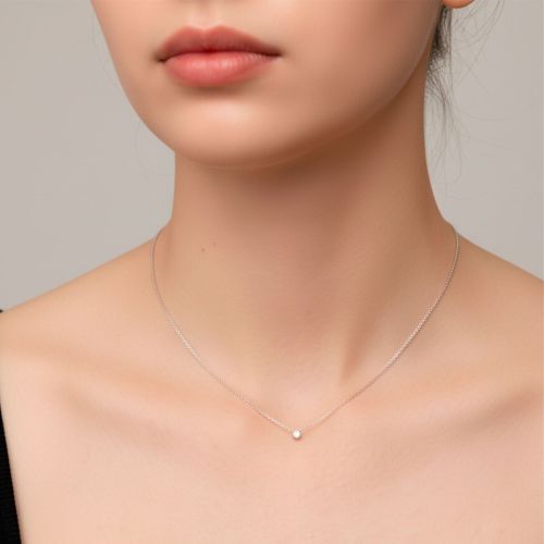 Colgante de oro blanco y diamante 0.30 quilates