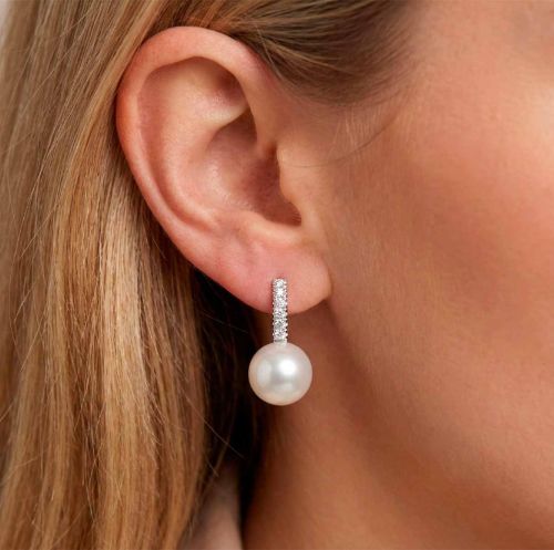 White gold australian pearl earrings with 0.16 carat diamonds
