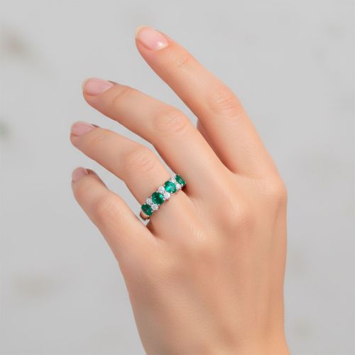White gold ring with 0.32 carat diamonds and 1.10 carat emeralds