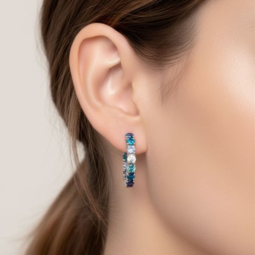 White gold hoop earrings with diamonds and sapphires