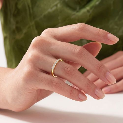 Yellow gold eternity ring with 0,08 carat white diamond 