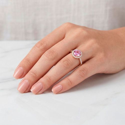 Rose gold ring with 0.13 carat diamonds and 0.60 carat pink sapphire