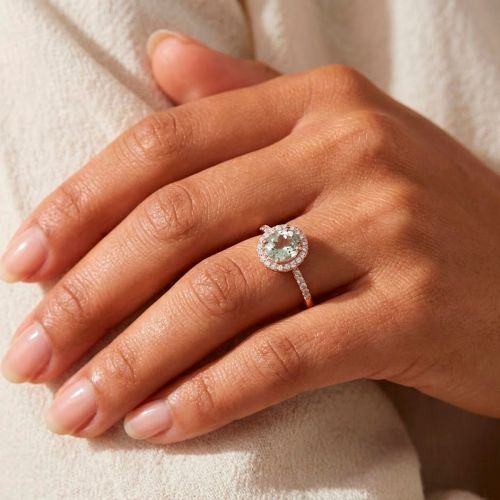 Rose gold ring with a 0.60 carat green sapphire