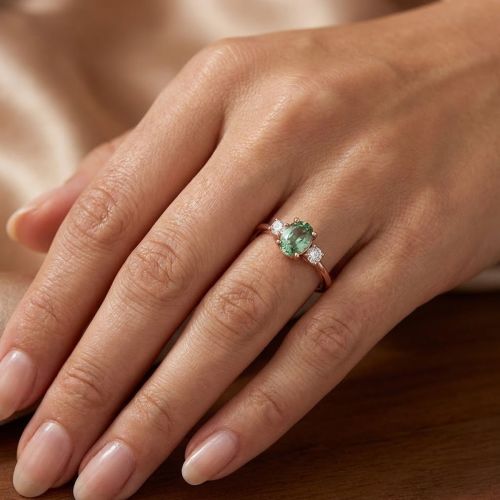 Rose gold ring with 0.13 ct diamonds and 0.60 ct sapphire