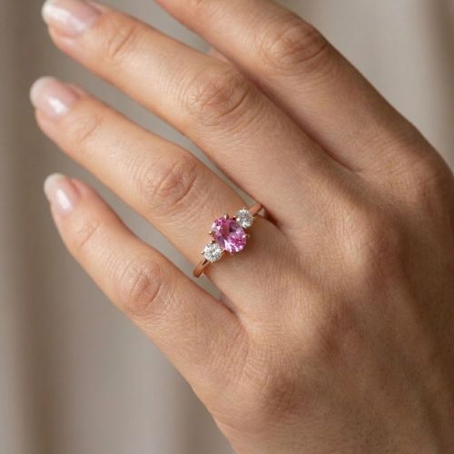 Rose gold ring with 0.13 ct diamonds and pink sapphire
