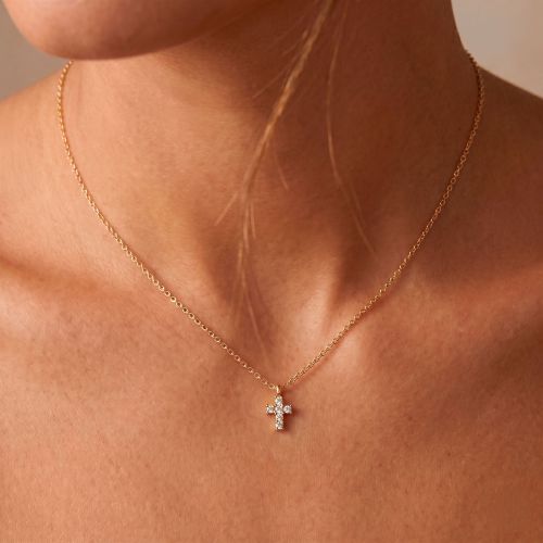 Yellow gold pendant with 0.09 carat diamond cross