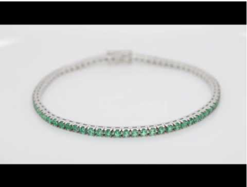 White gold riviere bracelet with brilliant-cut emeralds