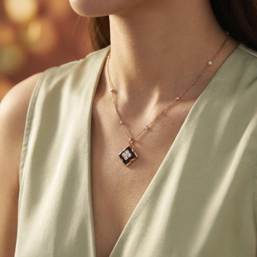 Rose gold necklace with diamonds and onyx