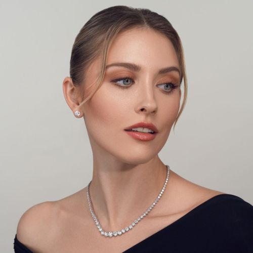 White gold solitaire earrings with 1 carat diamond