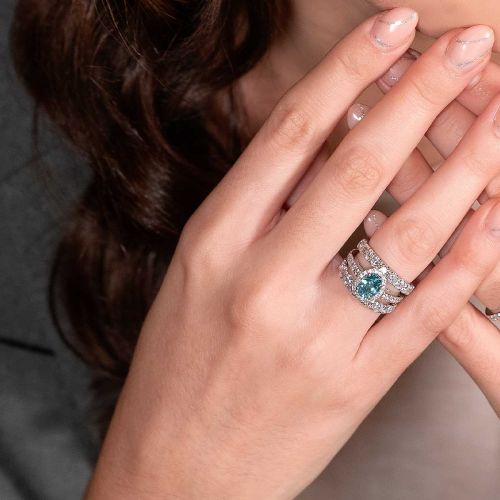 White gold ring 2.56 carats of diamonds and 1.03-carat oval-cut aquamarine